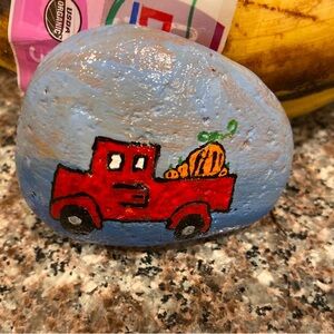 Hand-Painted Rock with Red Truck Design
